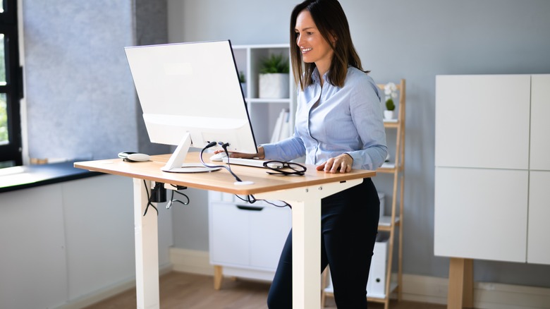Woman at a standing desk