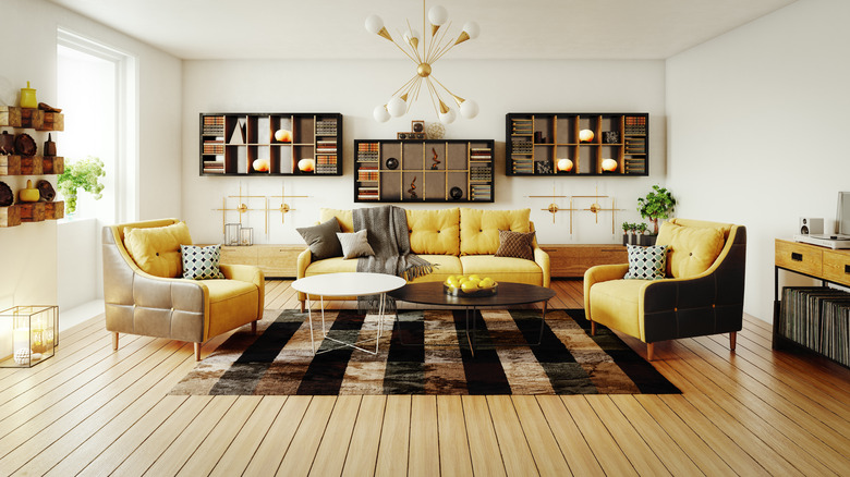 living room with yellow and black decor
