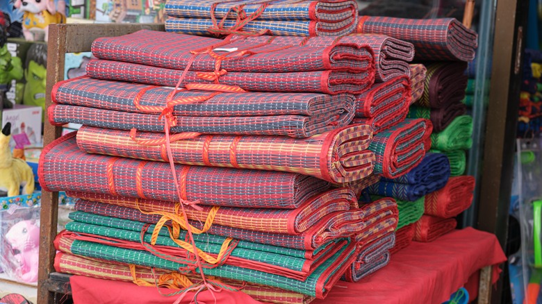 bundles of outdoor plastic rugs